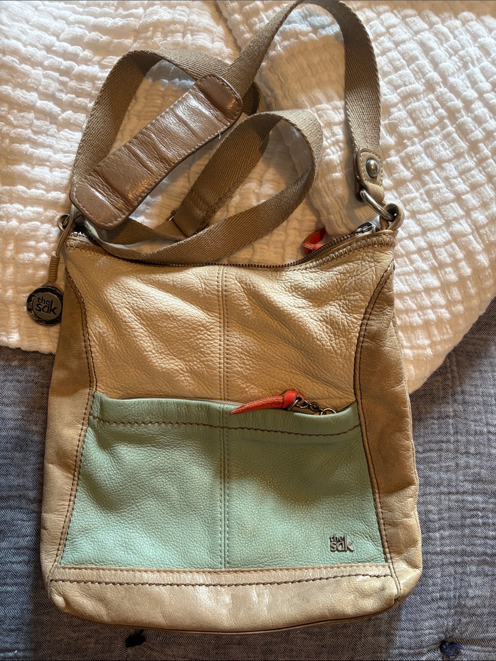 The Sak Beige and Sage Leather Crossbody Bag with Red Accent